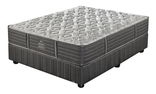 A Sealy Rialto Extra Firm queen size mattress and base set.