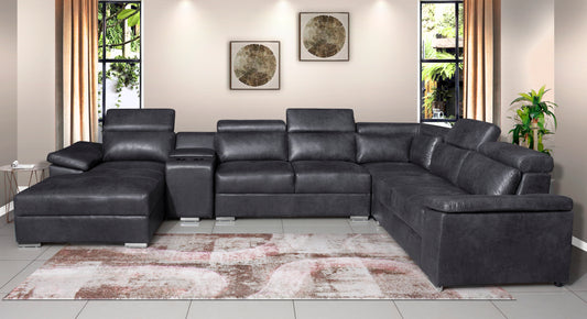 Gray sectional sofa in a living room setting with decor elements.