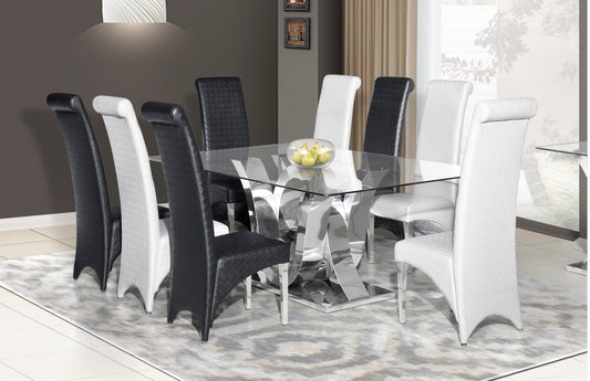 A dining set with a glass top table and a combination of black and white chairs, set against a home interior backdrop.