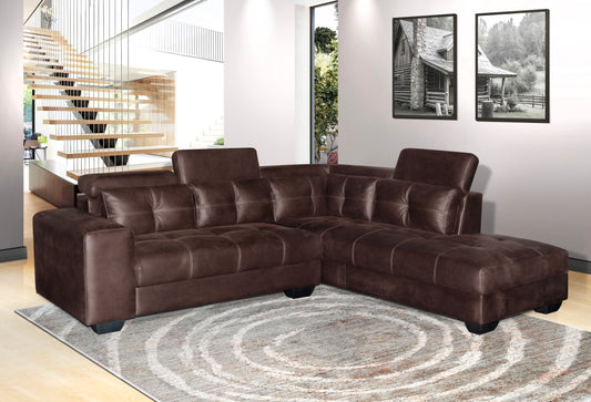 Brown leather sectional sofa in a living room setting with a rug and wall art.