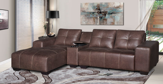 Brown leather sectional sofa in a living room setting with a painting on the wall.